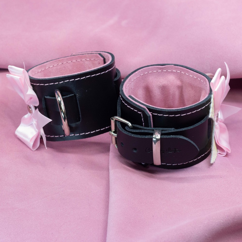 Bondage Cuffs - Black Leather lined with Pretty Baby Pink Suede with Pink Bow and Angel Wings