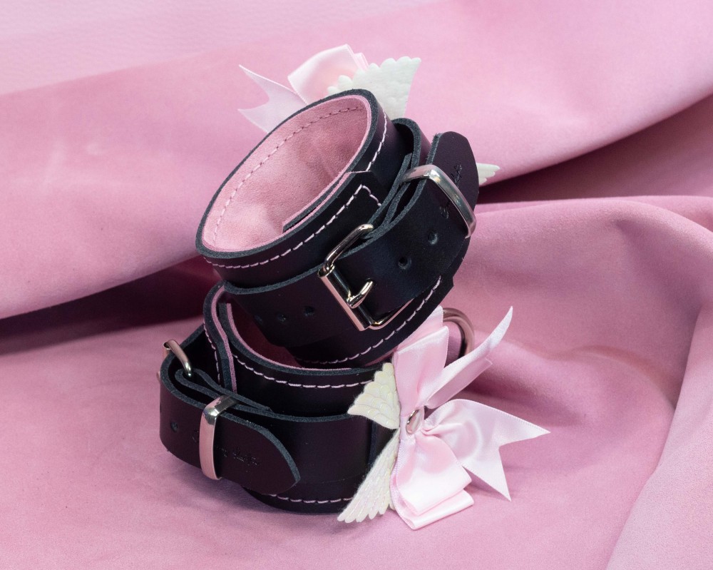 Bondage Cuffs - Black Leather lined with Pretty Baby Pink Suede with Pink Bow and Angel Wings