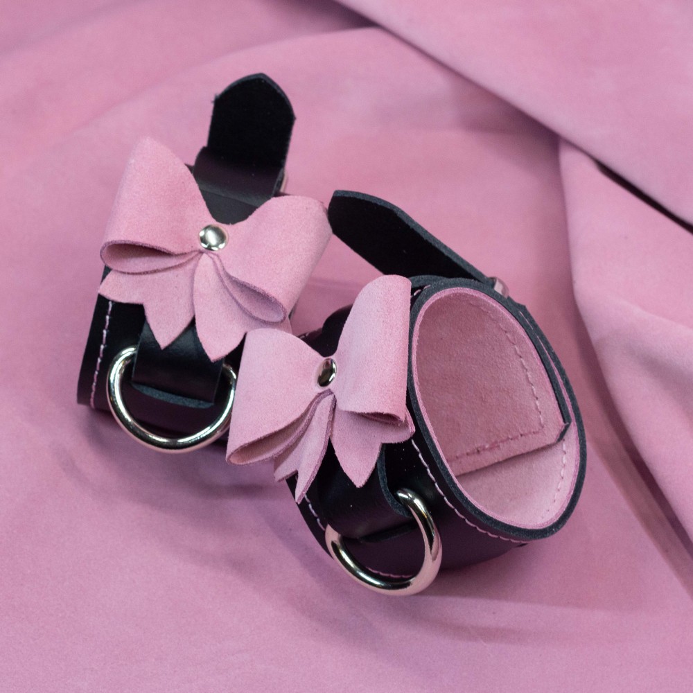 Bondage Cuffs - Black Leather lined with Pretty Baby Pink Suede with Pink Bows