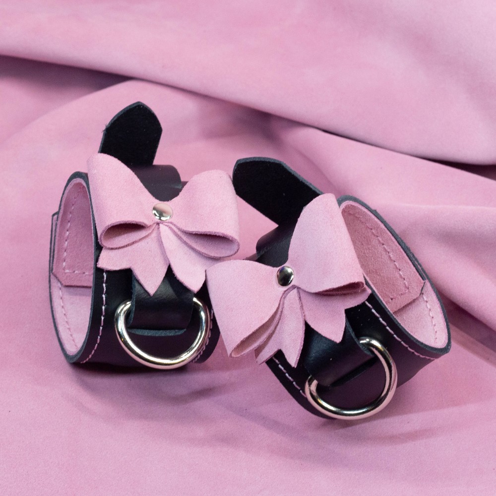 Bondage Cuffs - Black Leather lined with Pretty Baby Pink Suede with Pink Bows