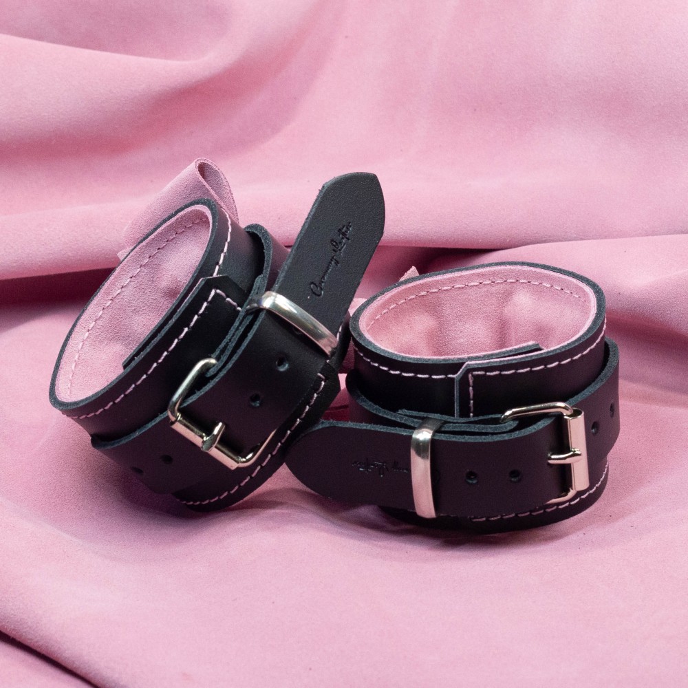 Bondage Cuffs - Black Leather lined with Pretty Baby Pink Suede with Pink Bows