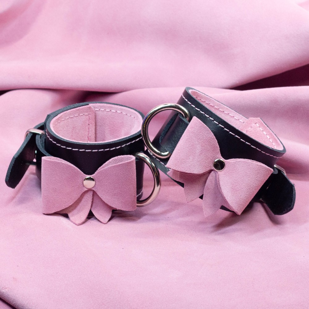 Bondage Cuffs - Black Leather lined with Pretty Baby Pink Suede with Pink Bows