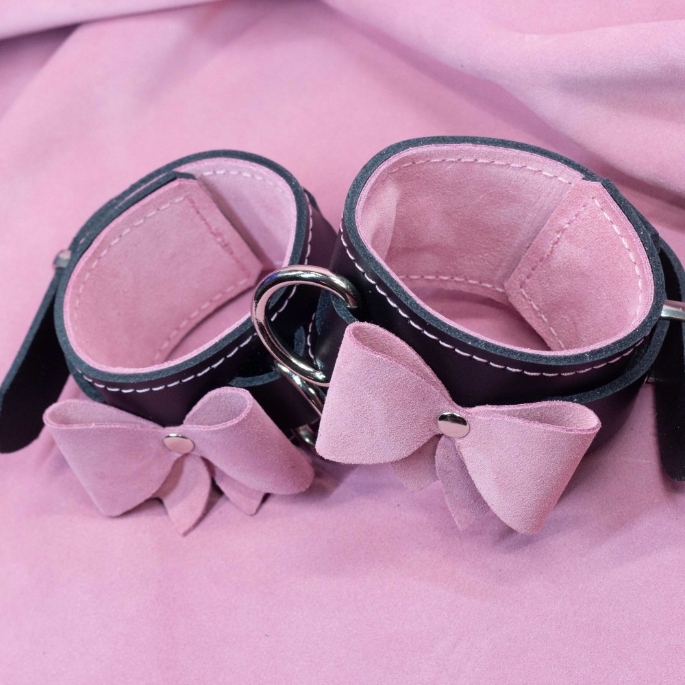 Bondage Cuffs - Black Leather lined with Pretty Baby Pink Suede with Pink Bows