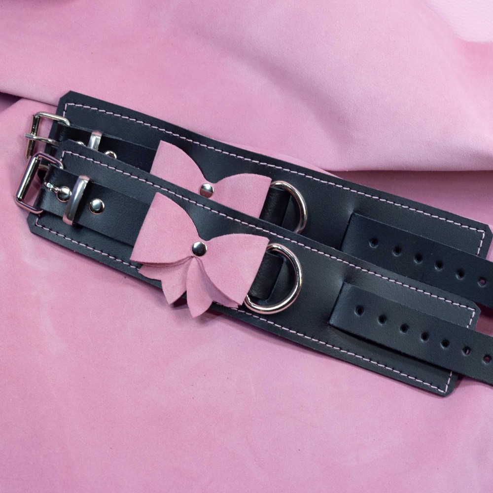 Bondage Cuffs - Black Leather lined with Pretty Baby Pink Suede with Pink Bows